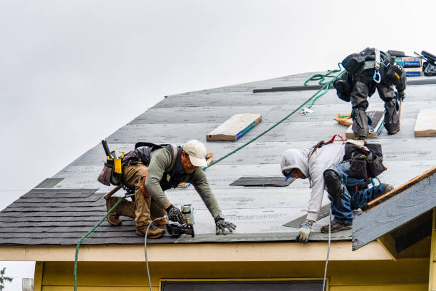 Professional Gutter Installation technician working in Astoria, NY